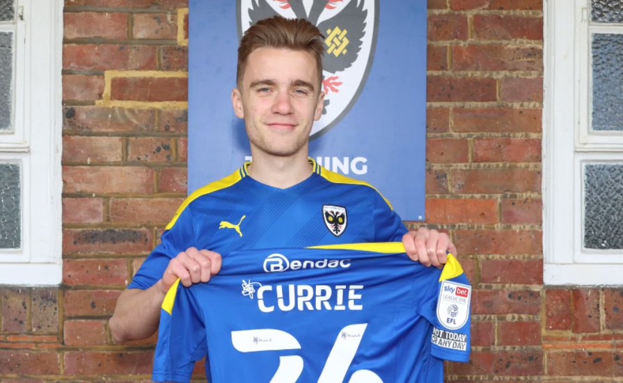 Former Apprentice Currie Commits to Dons